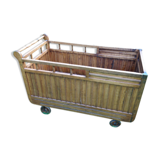 Wooden wheeled cradle