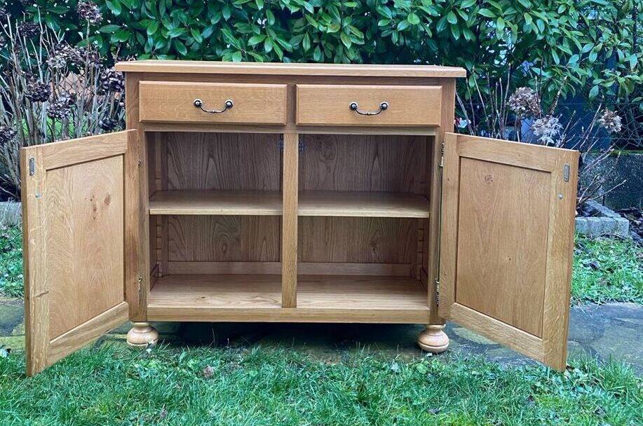 Solid oak sideboard. Three drawers.