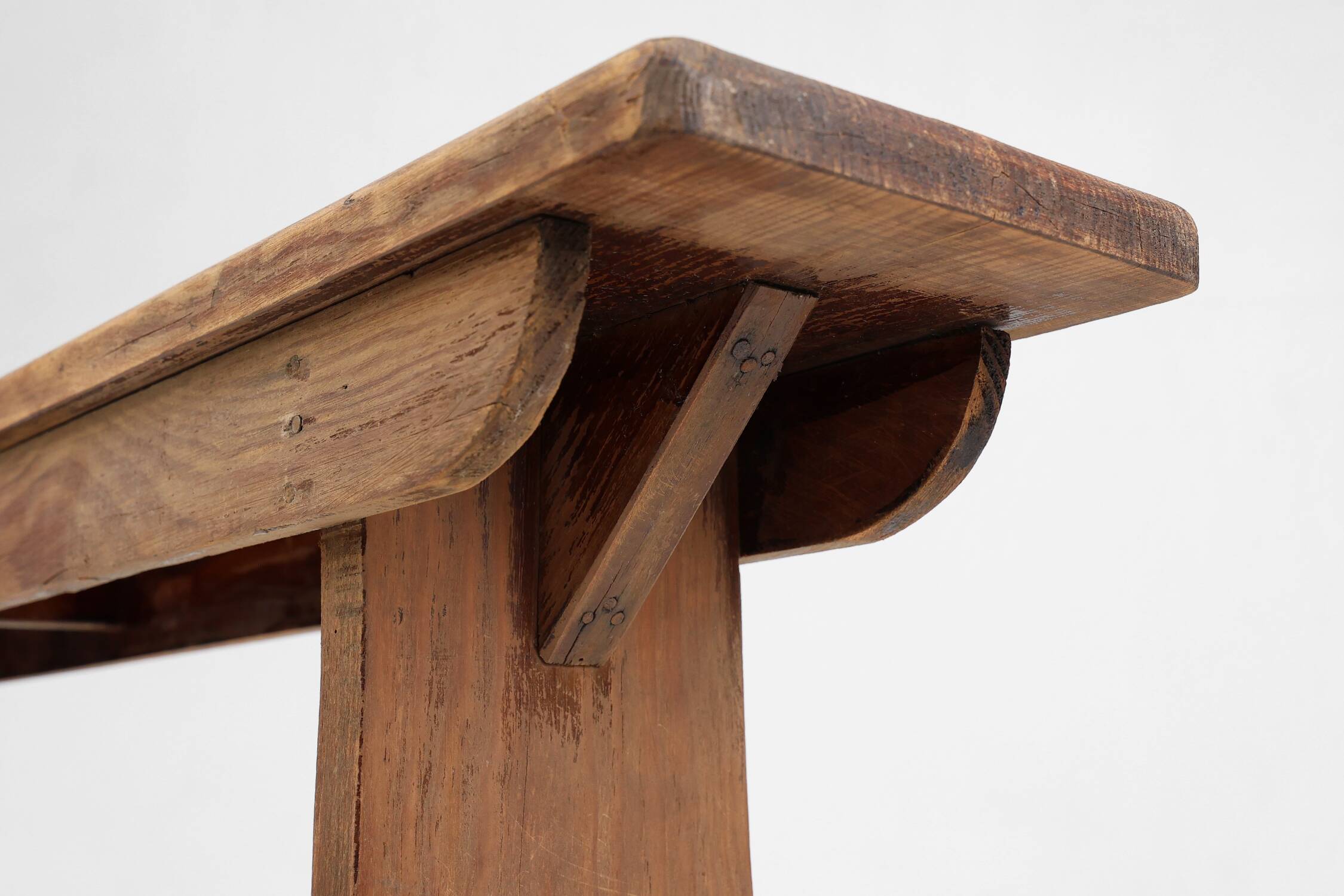 Rustic natural oak wooden bench with rounded details, France ca. 1900