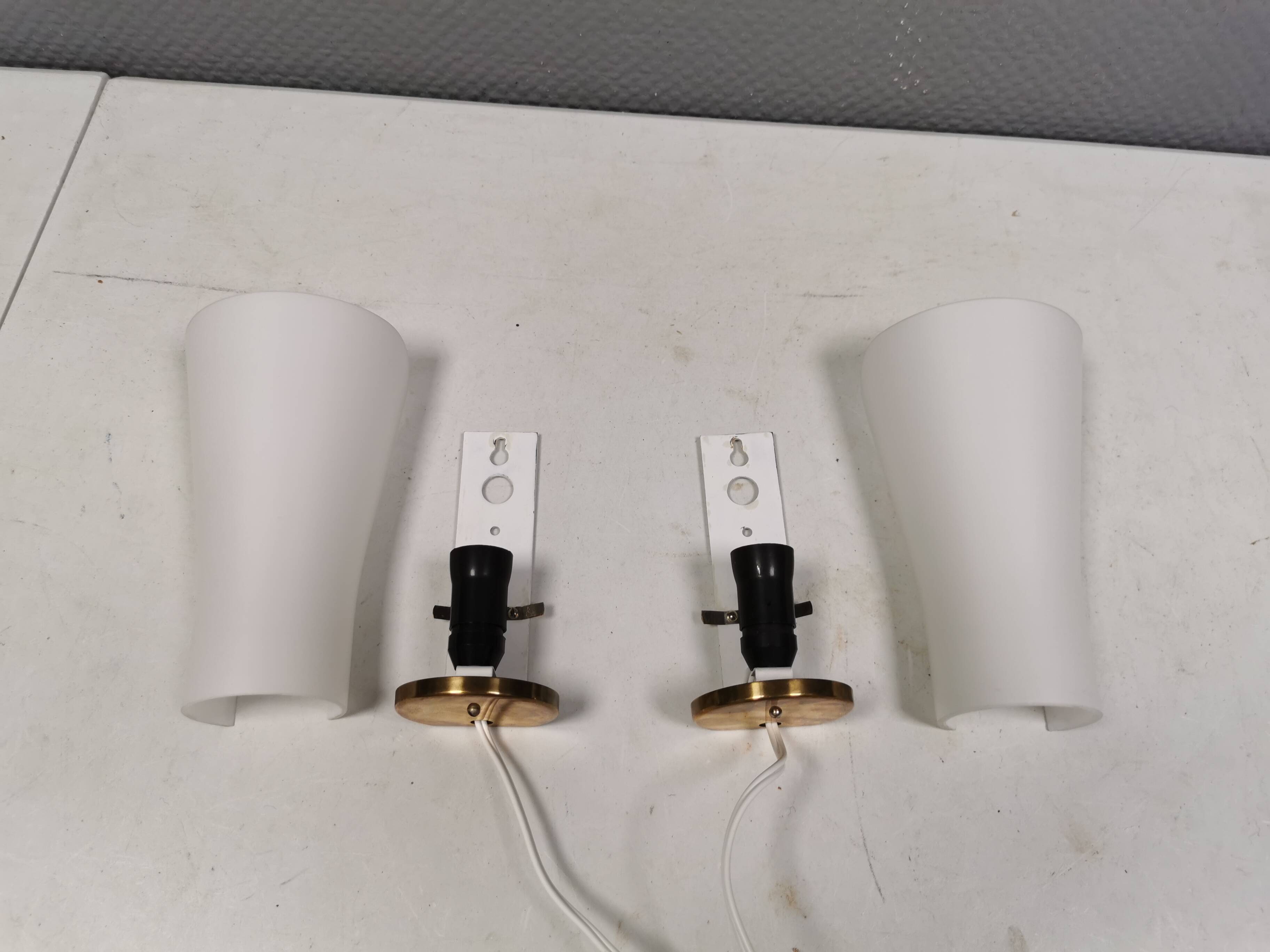 A set of retro wall lamps with white opal glass shades, Denmark 1950s