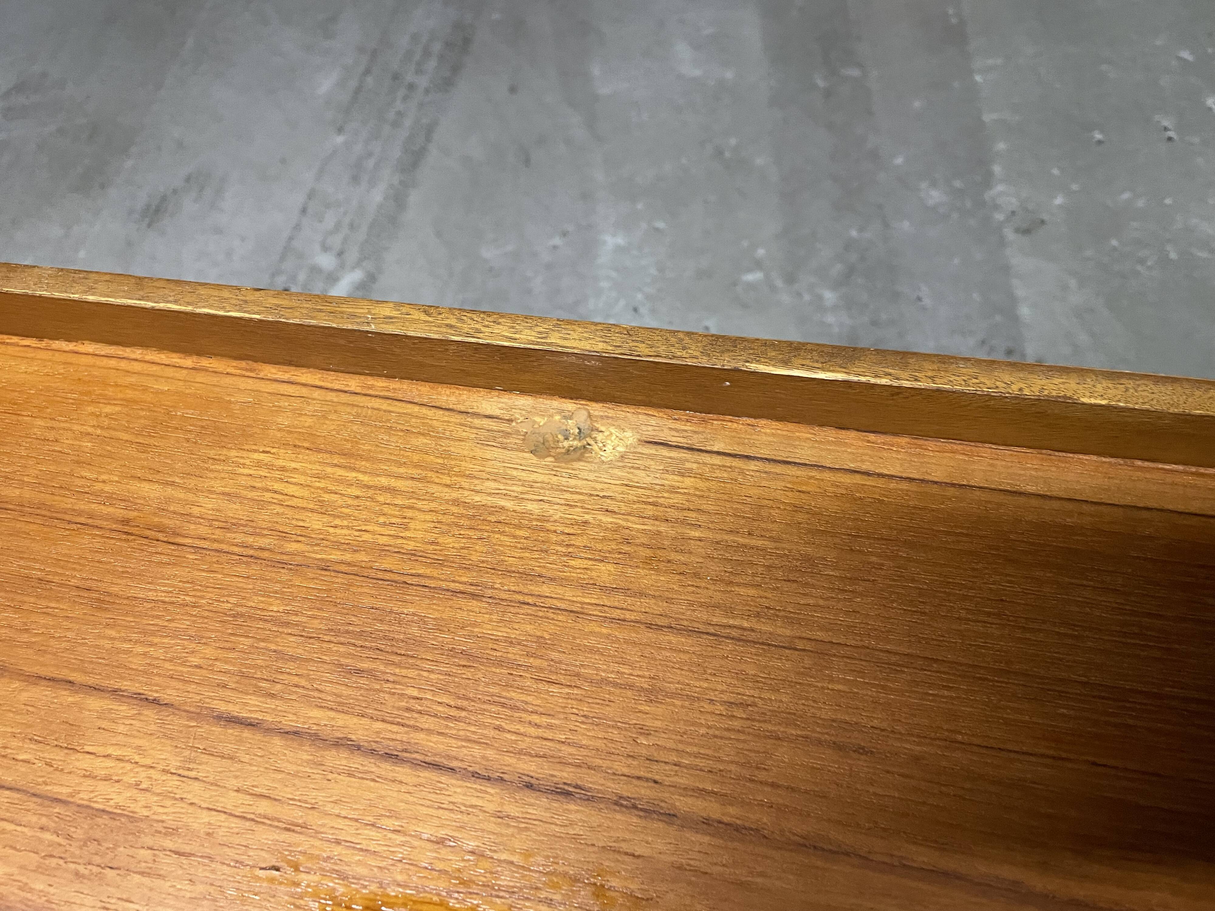 Teak enfilade from the 1970s by the English brand William Laurence.