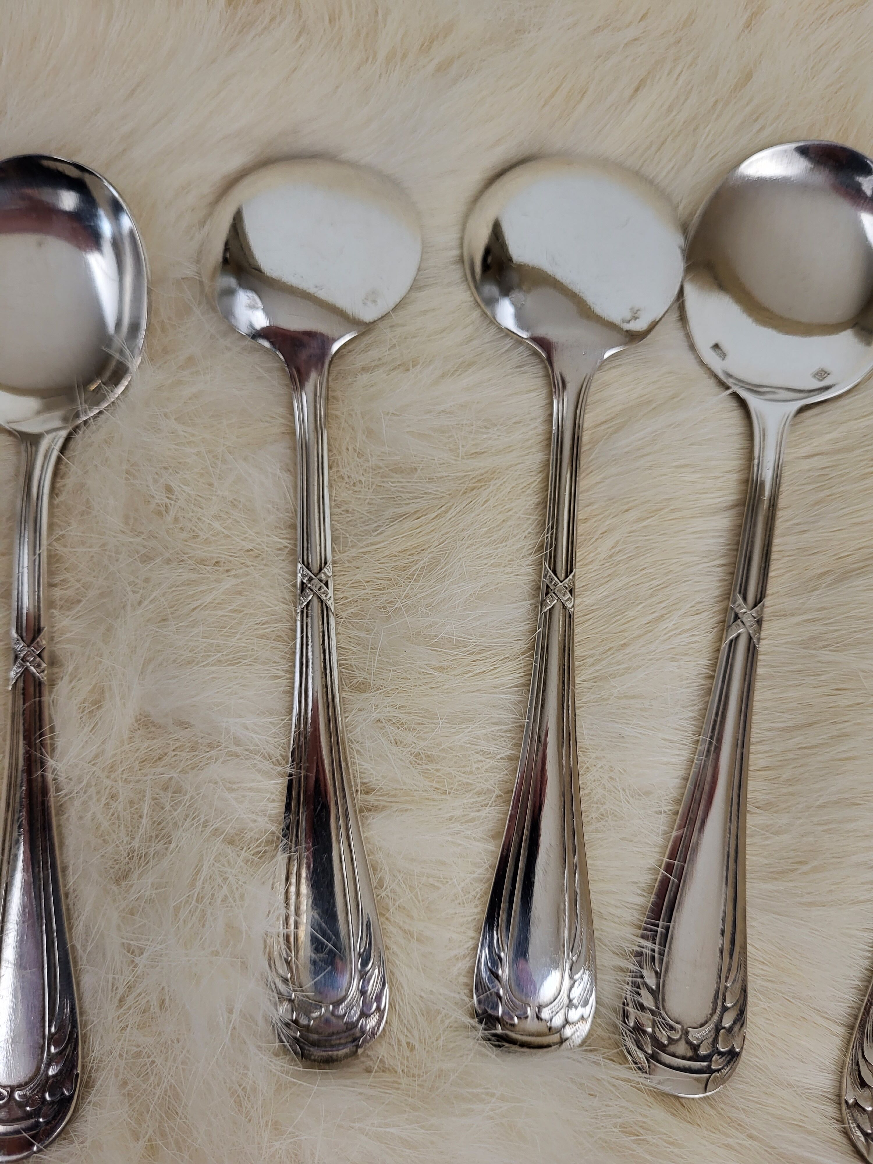 Set of 6 silver metal cream spoons