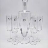 Carafe and 6 stemmed glasses made of Murano glass.
