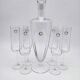 Carafe and 6 stemmed glasses made of Murano glass.