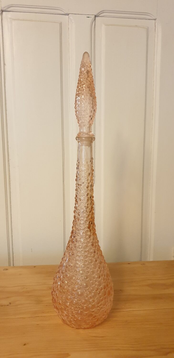 Rare pink polished glass bottle