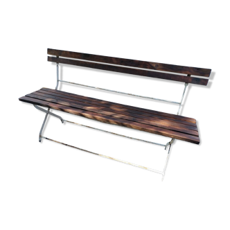 Folding garden bench in wrought iron and wood