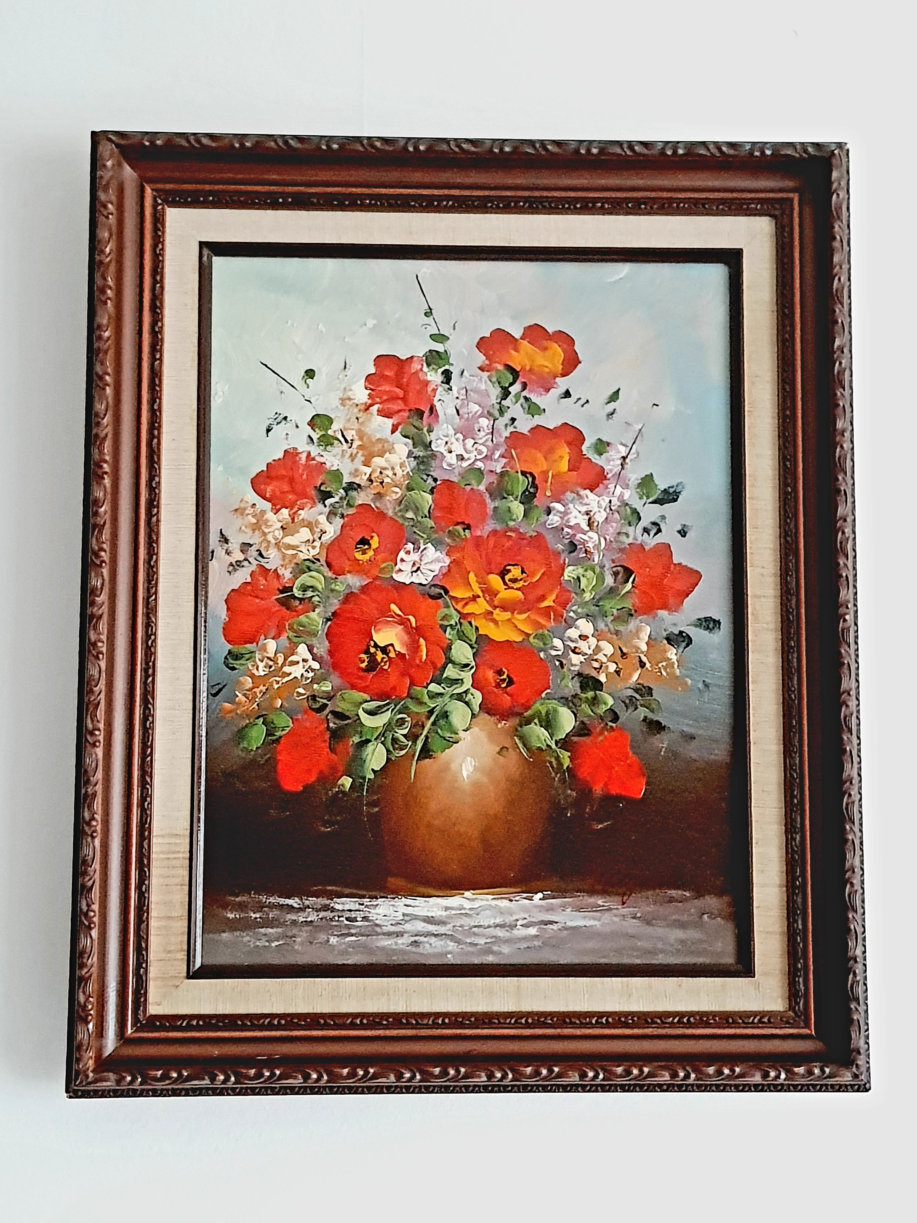 Oil on canvas bouquet of red flowers signed