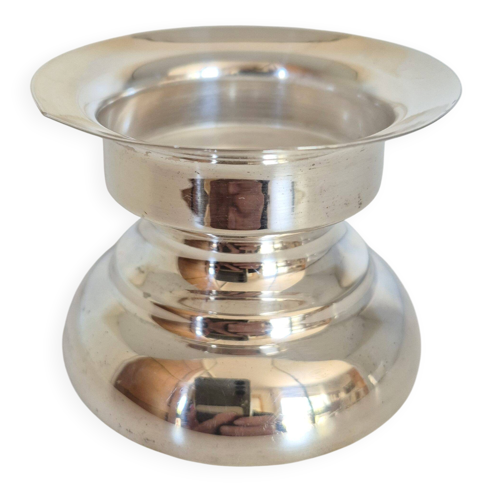 Antique silver candle holder.