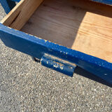 Blue-painted wooden table with drawer