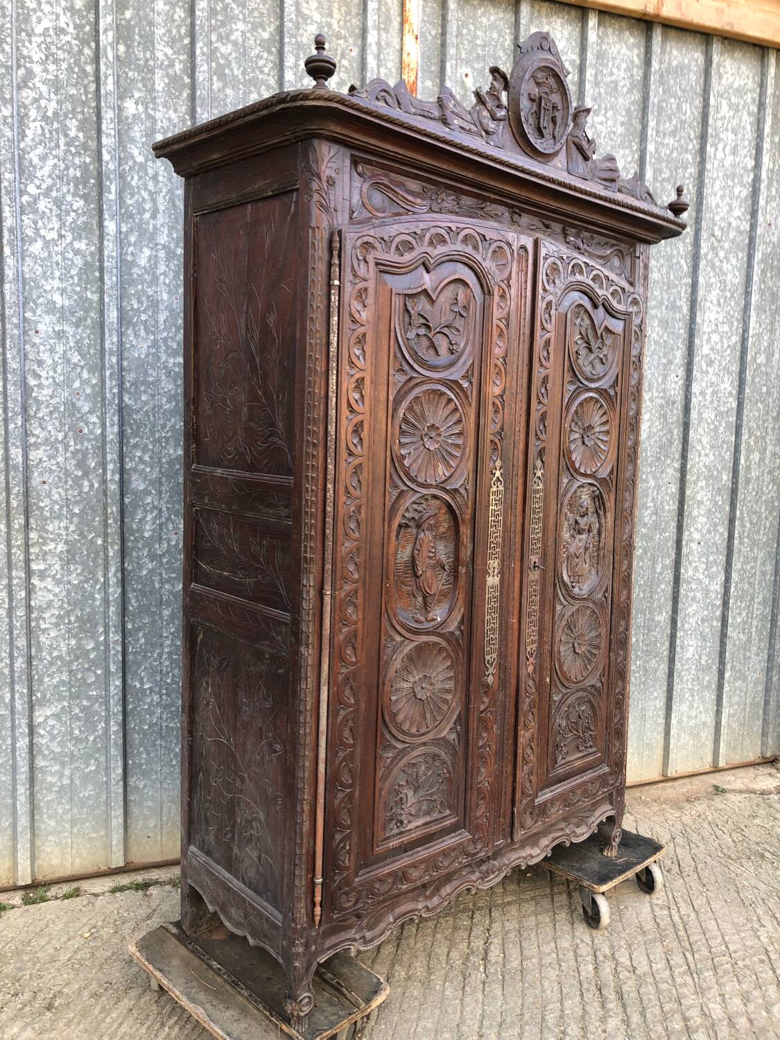Antique Breton oak cabinet, richly carved