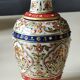 Hindu marble vase with floral decoration and gold leaf, in a box. Height 20 cm.