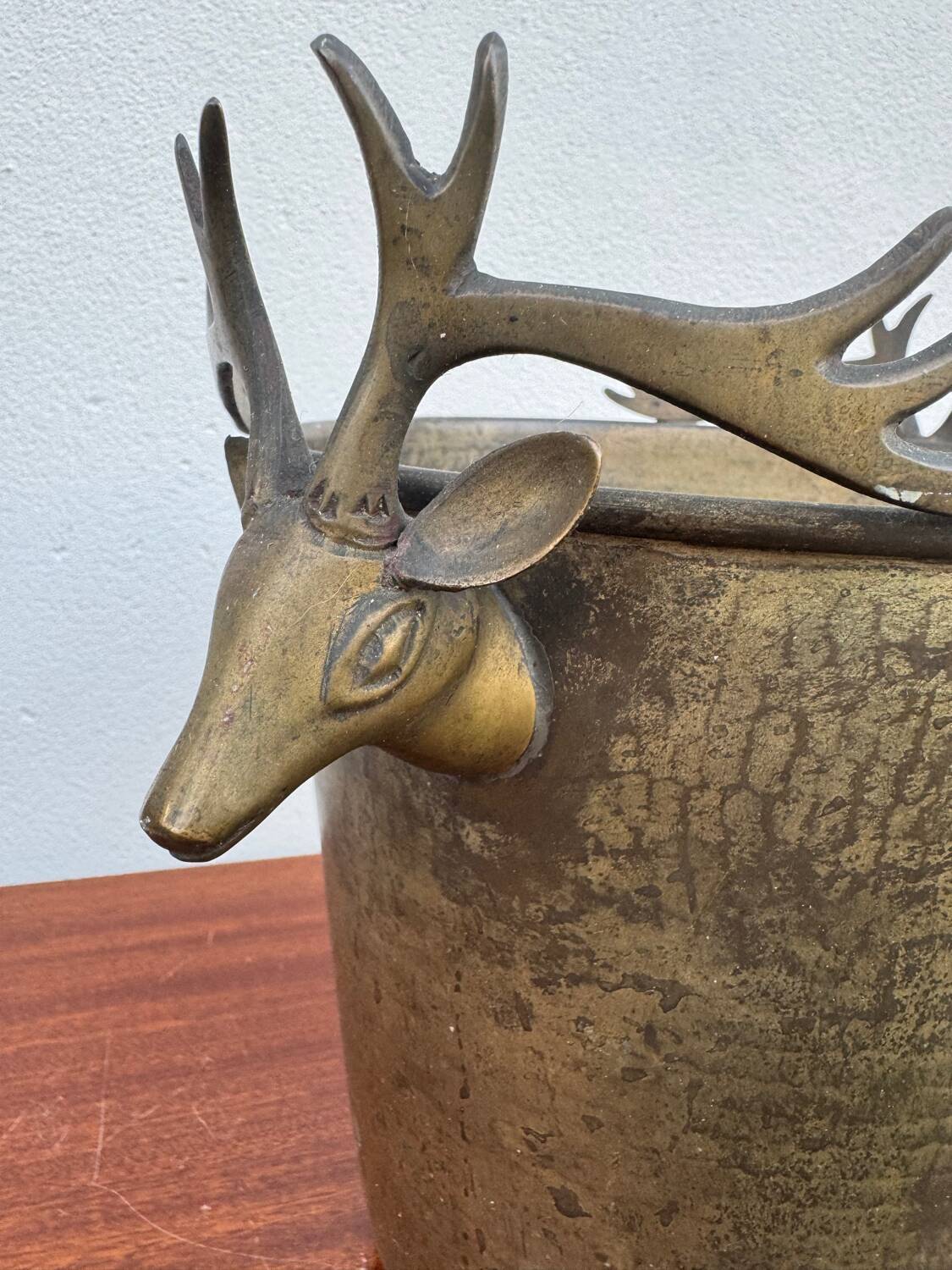 Antique champagne cooler with stag heads