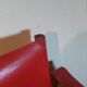 Wood and red leather armchair 60