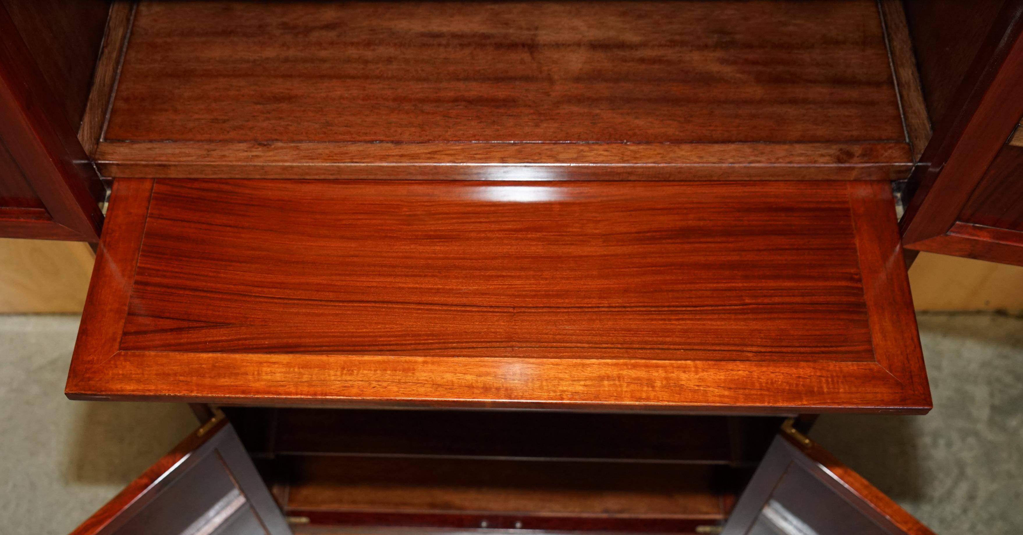 Set of three vintage hardwood military-style bookshelves.