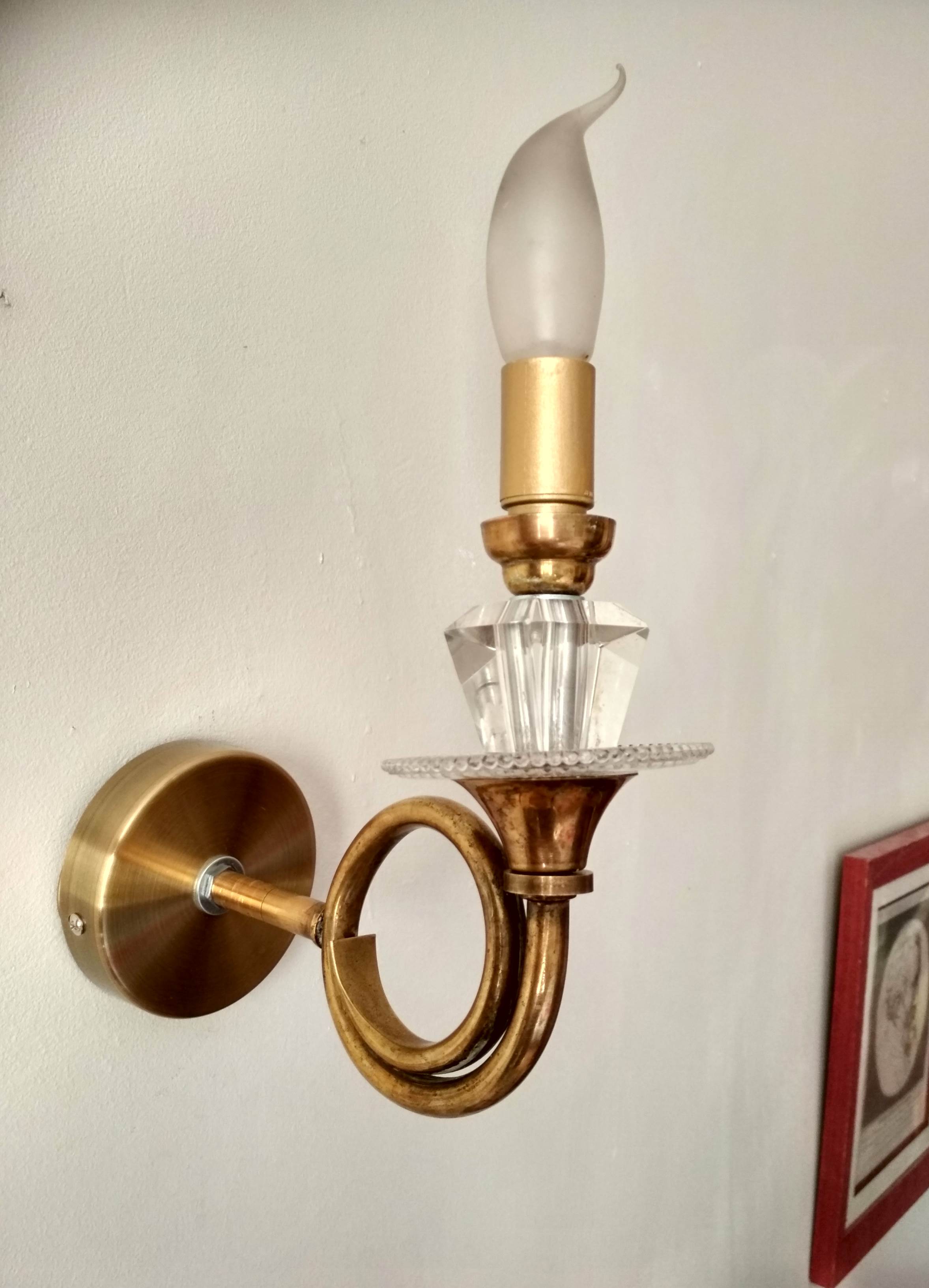 Pair of old brass wall sconces