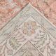 Tapis vintage à décor floral rouge et beige