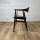 Vintage Scandinavian armchair in teak and black skai, 60s