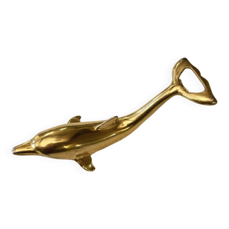 Dolphin bottle opener in gold metal, 1970s