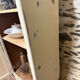 Small one-door Art Deco cabinet with a patina.