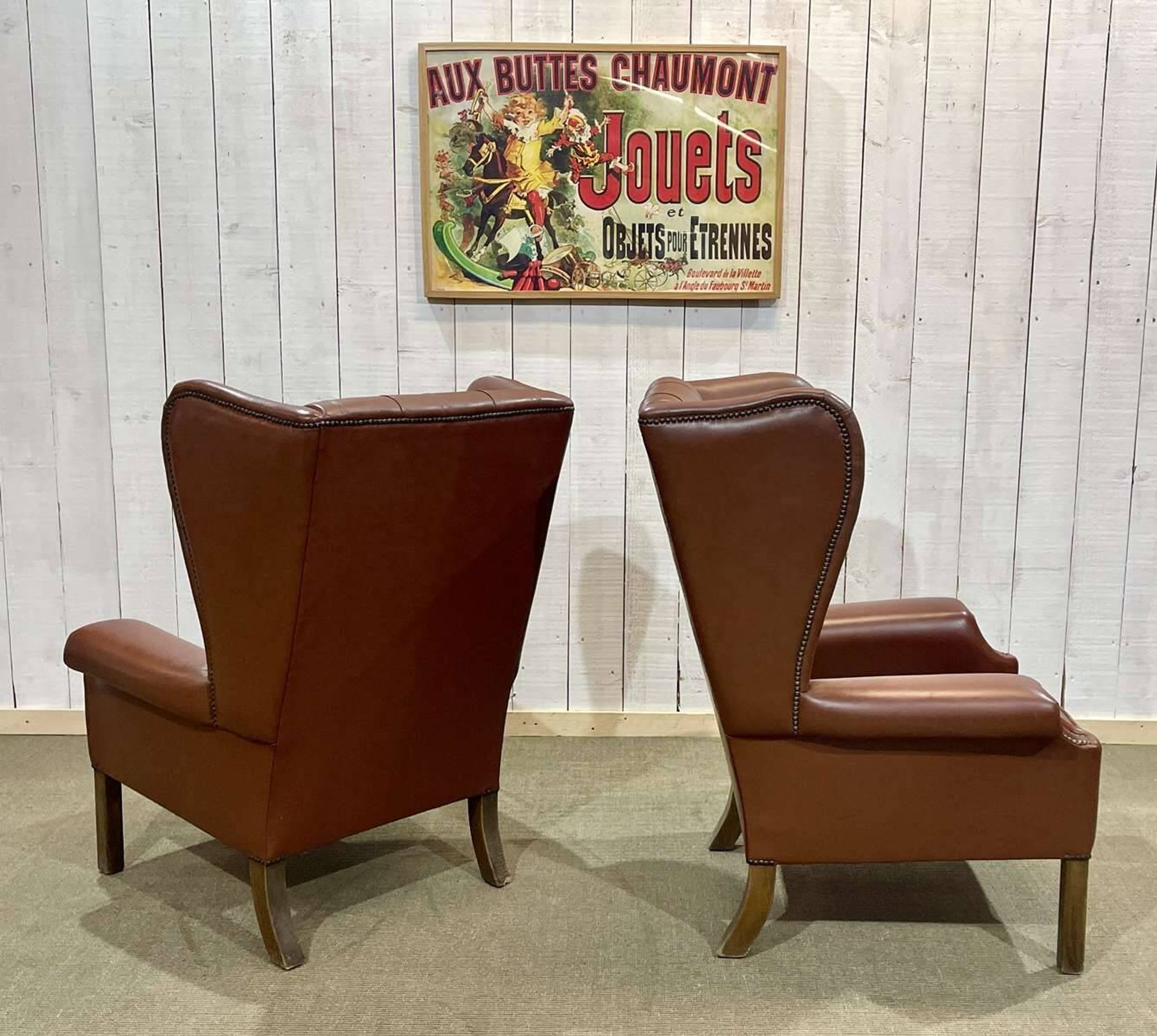 Pair of 1970s Chesterfield wingback chairs in brown leather