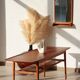Vintage Scandinavian coffee table in teak and rattan – Danish design from the 1960s.
