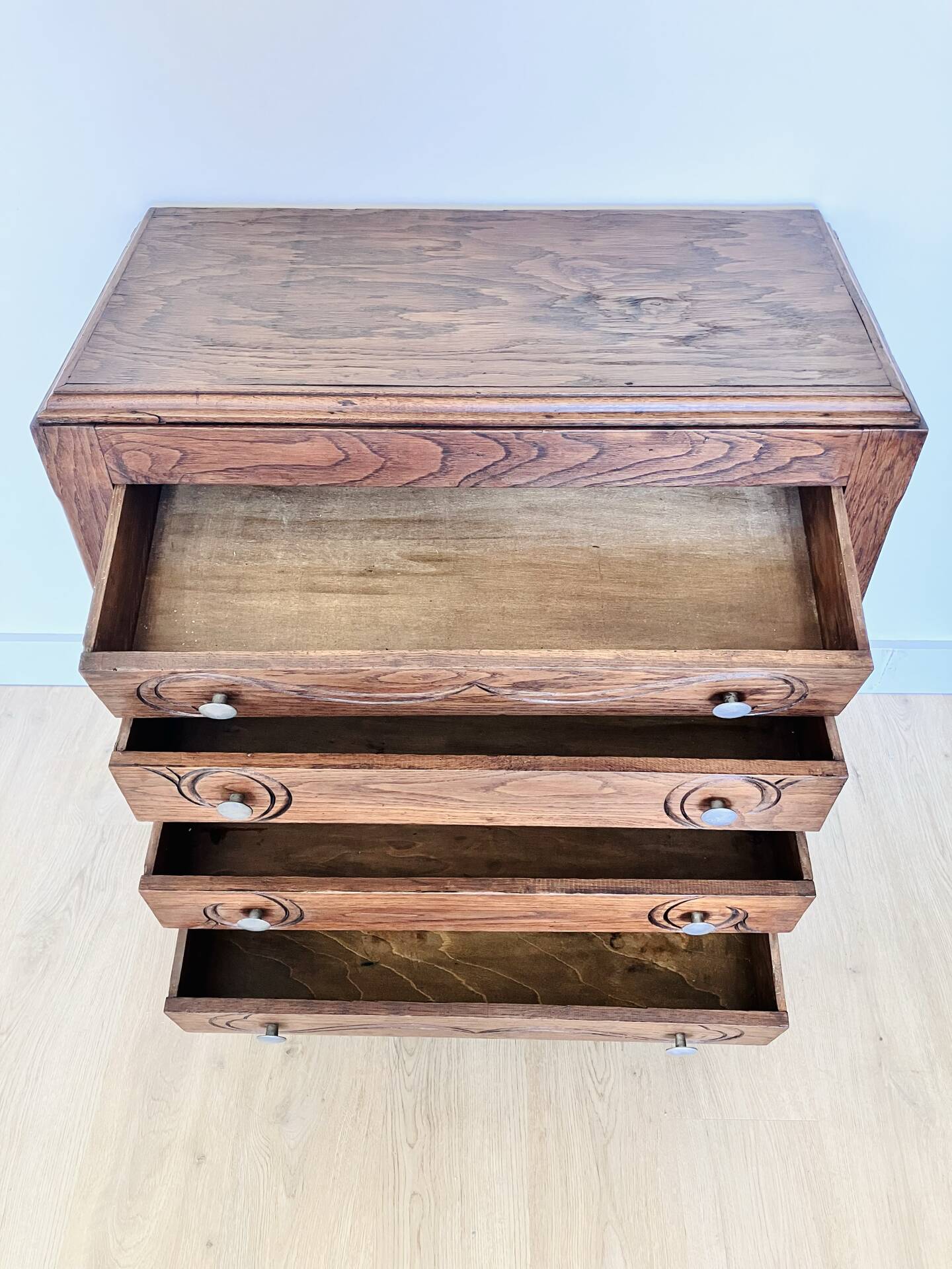 Antique commode with carved relief
