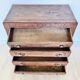 Antique commode with carved relief