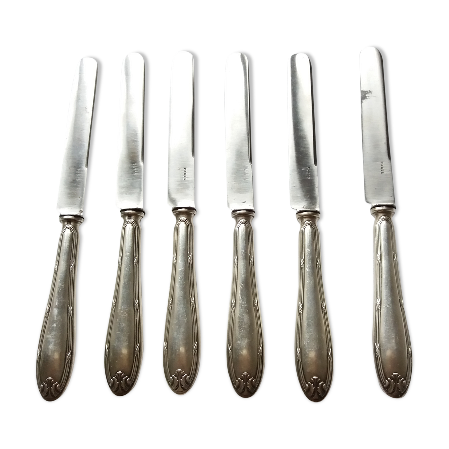 Six cheese knives or fruit knives in silver metal