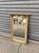 Painted wooden mirror.