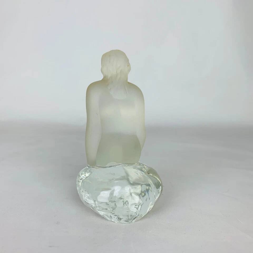 Vintage moulded glass mermaid sculpture.