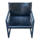 Postmodern lounge chair in black saddle leather and midnight blue wood, 1980.