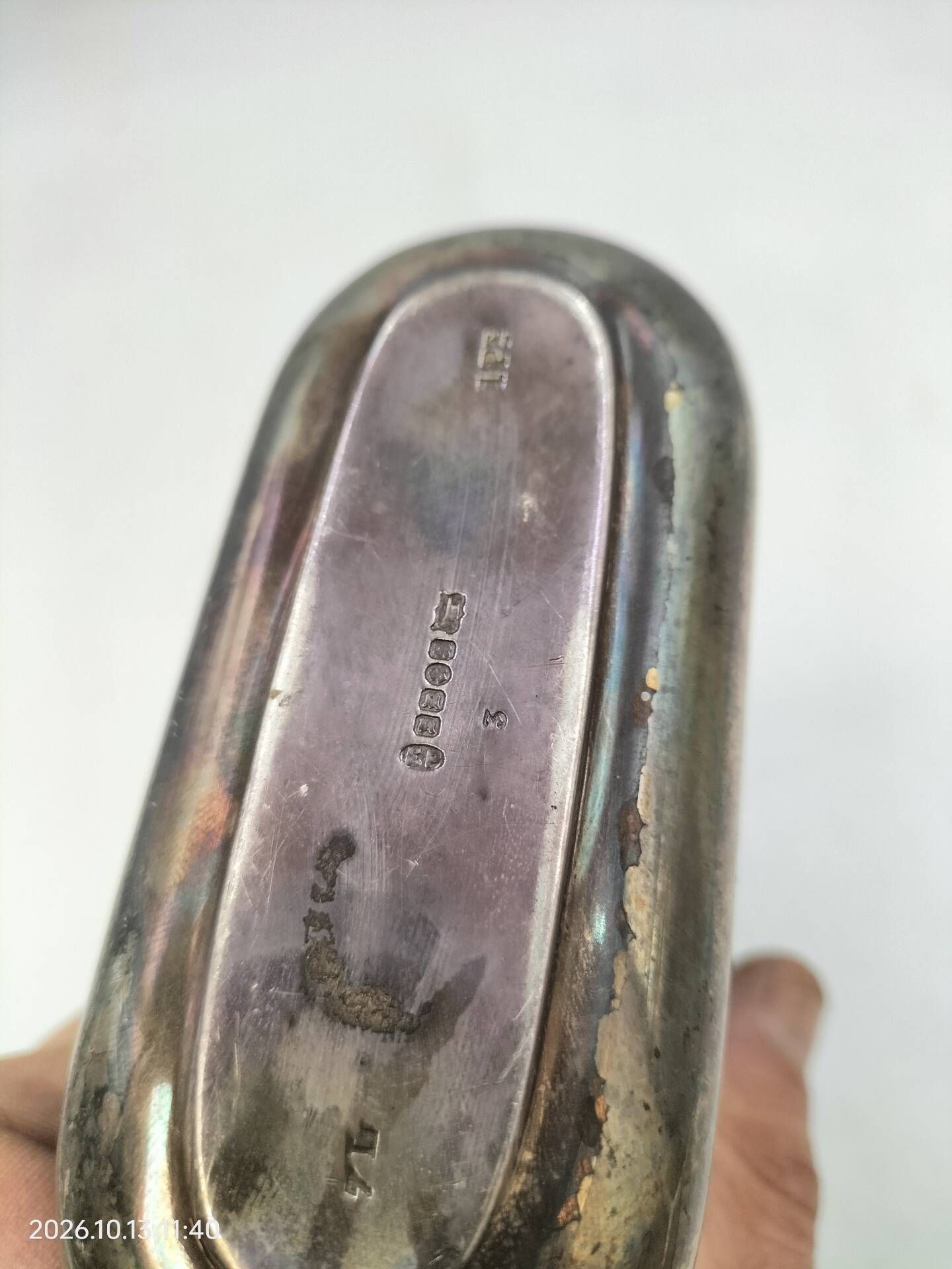 Silver-plated metal flask with leather and glass