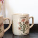 2 tasses à thé en grès moucheté fleurs rosa canina