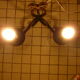 Pair of wrought iron wall lamps