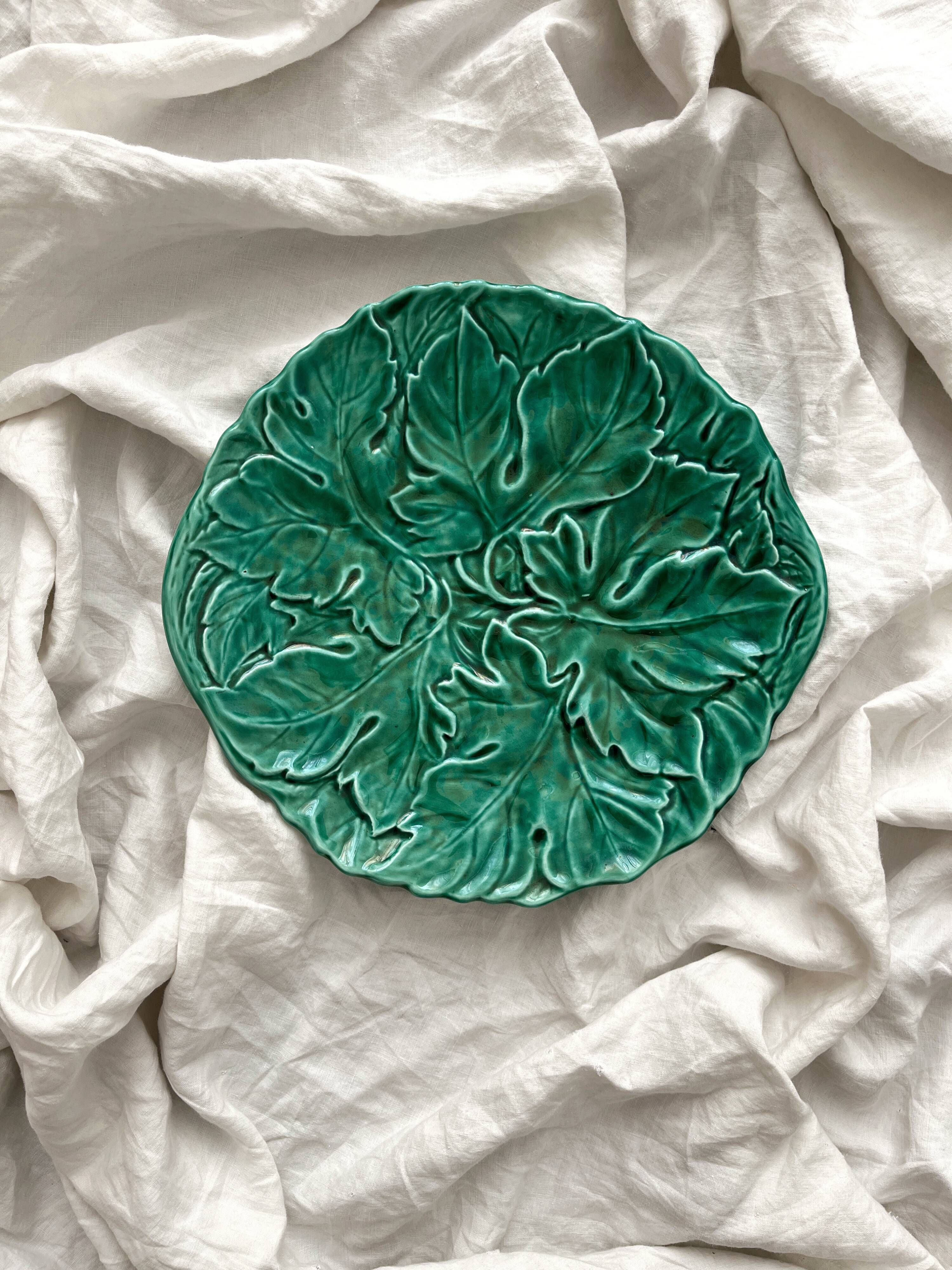 Round barbotine dish decorated with green leaves, Digoin vintage