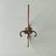 Old coat hook in solid golden brass
