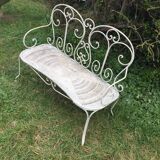 Banquette de jardin ancienne en fer forgé. Vers 1900