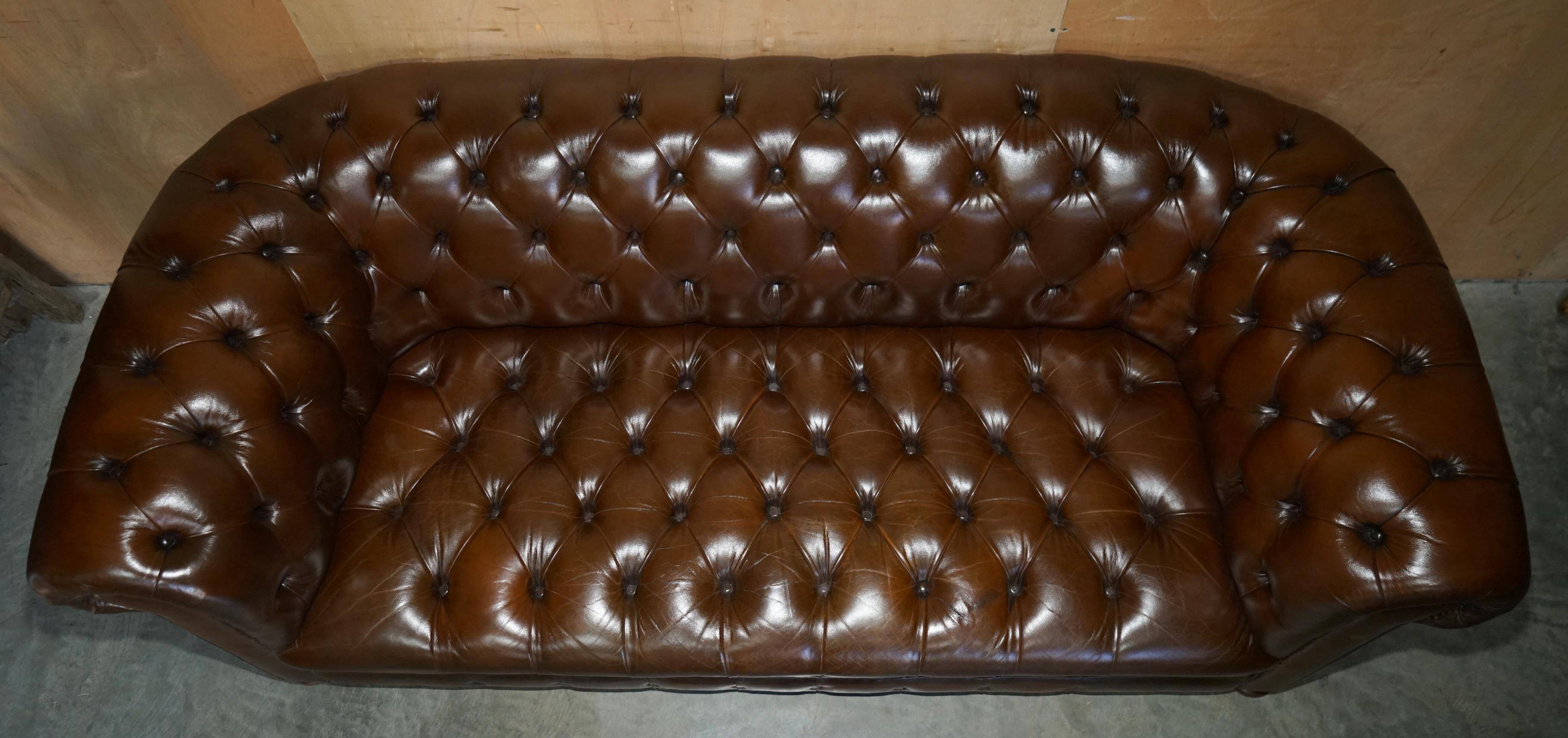Restored Chesterfield leather sofa in vintage Art Deco style