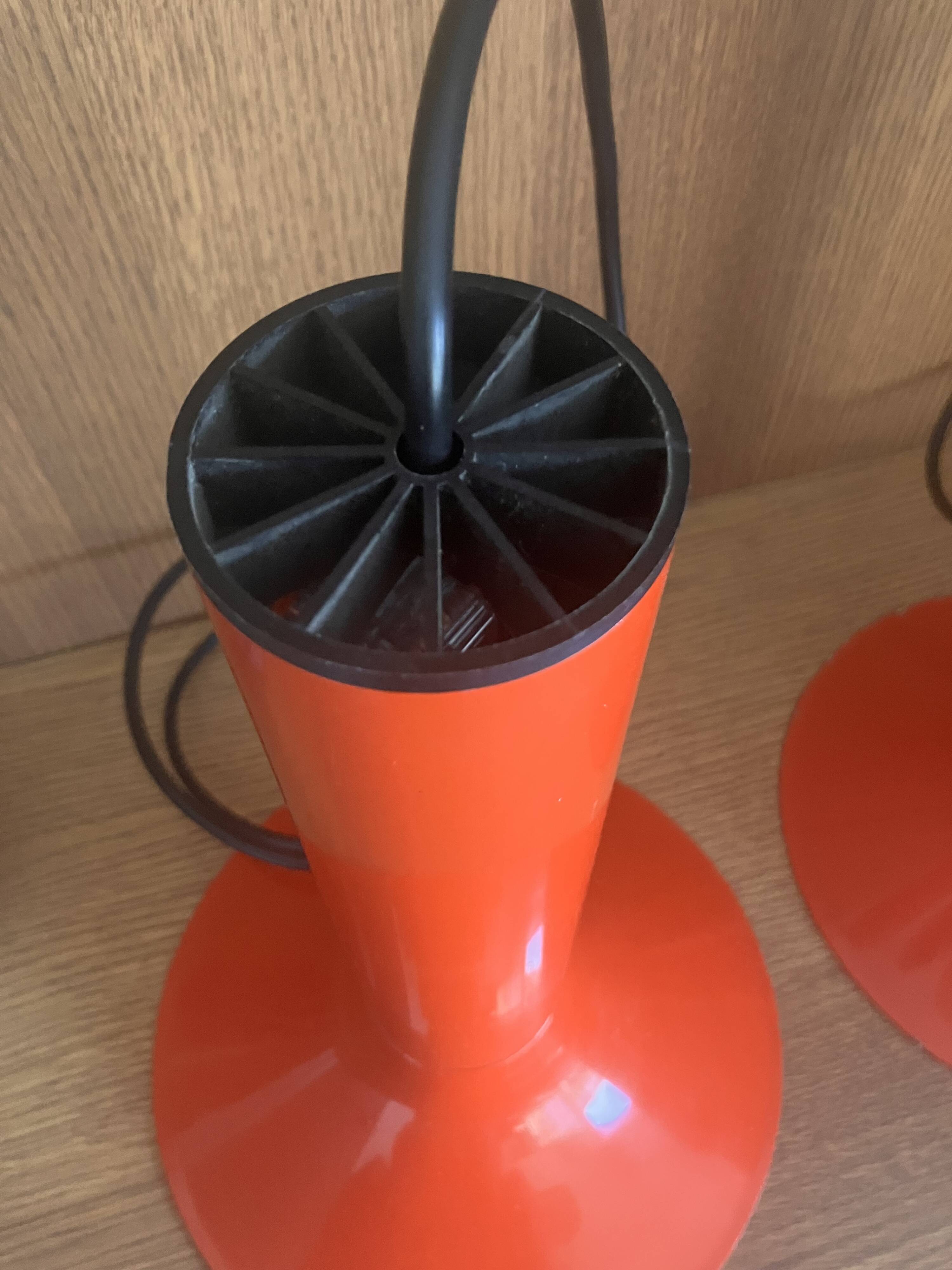 Pair of Lita metal orange pendant lights from the 70s Space Age.