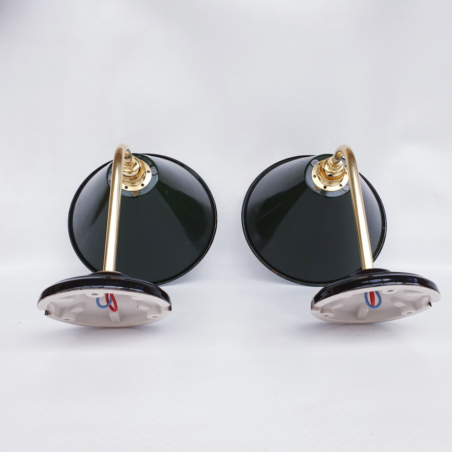 Pair of antique enamelled sheet metal wall lights