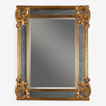 Richly decorated wall mirror in resin with golden ornaments and smoked mirror glass panels, Belgium,