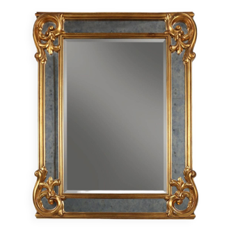 Richly decorated wall mirror in resin with golden ornaments and smoked mirror glass panels, Belgium,