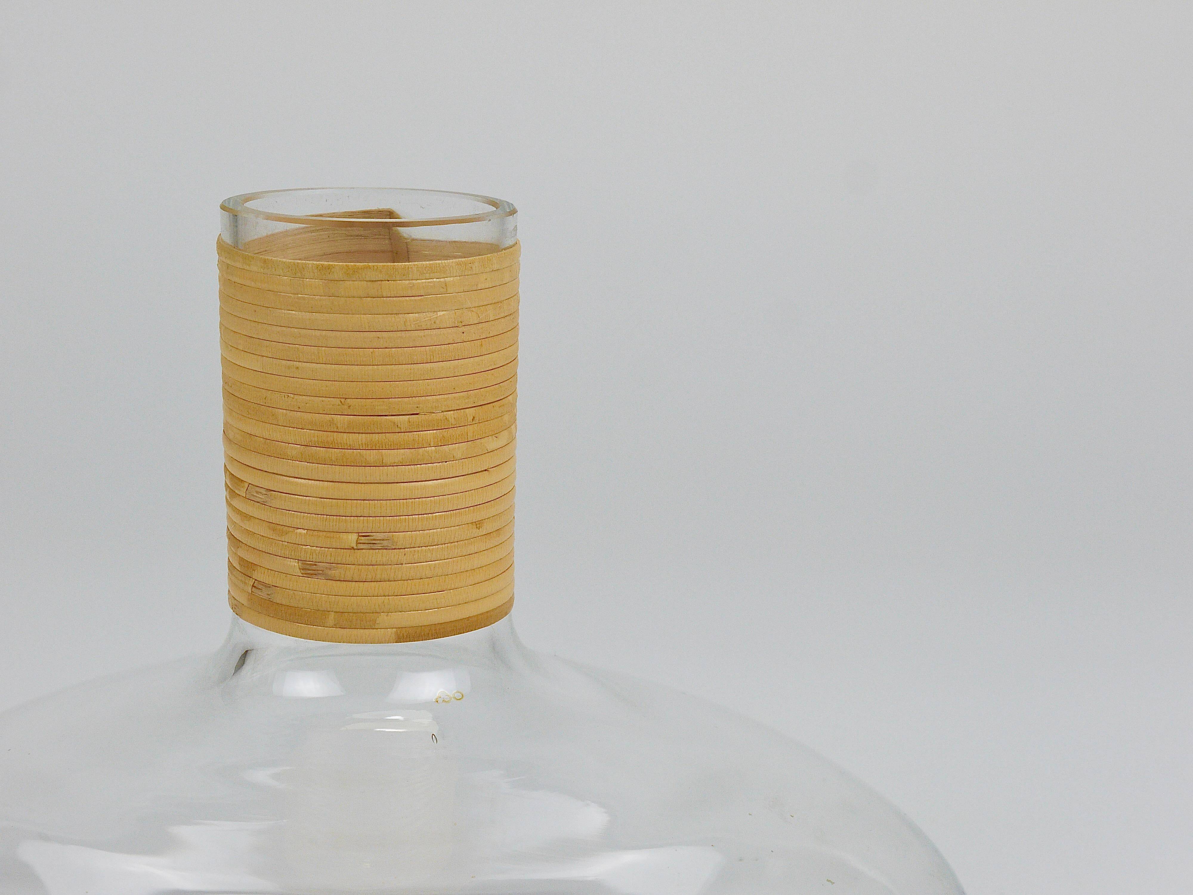 Vase by Carl Auböck decanter "Tuberkulinkolben" tall in rattan, Austria, 1950s.