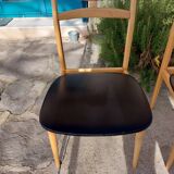 5 Scandinavian style chairs, wood and black faux leather.