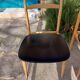 5 Scandinavian style chairs, wood and black faux leather.