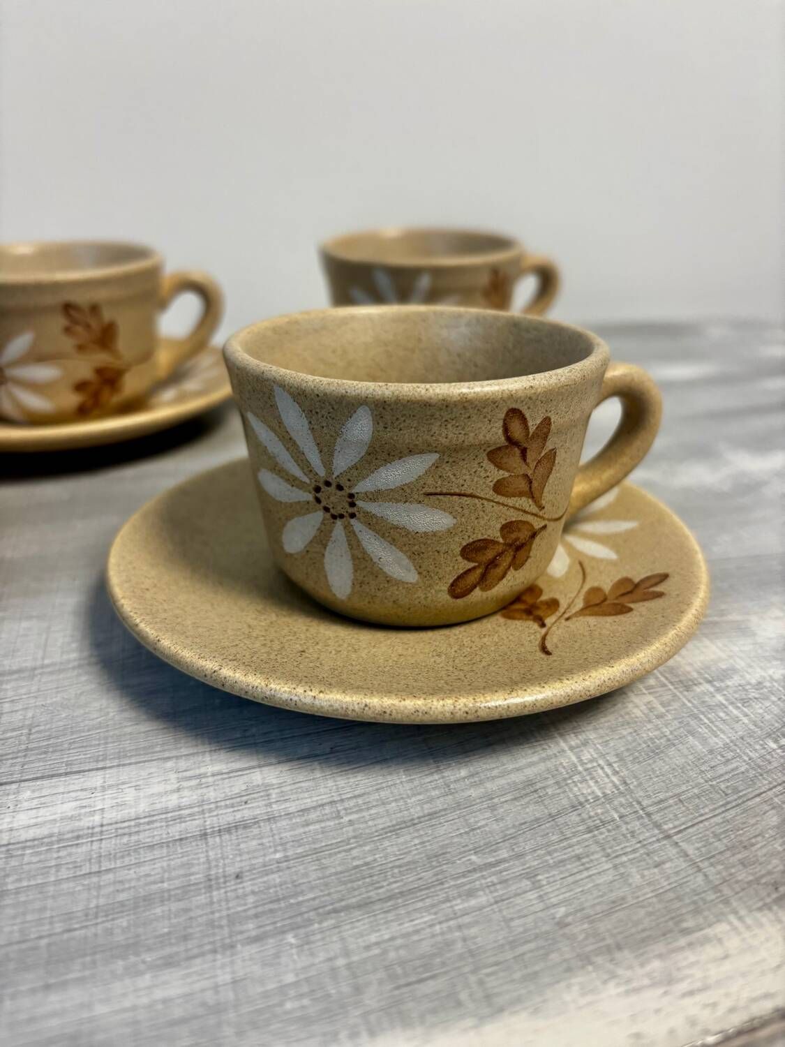 Set of 5 St Amand Autumn porcelain cups and saucers.