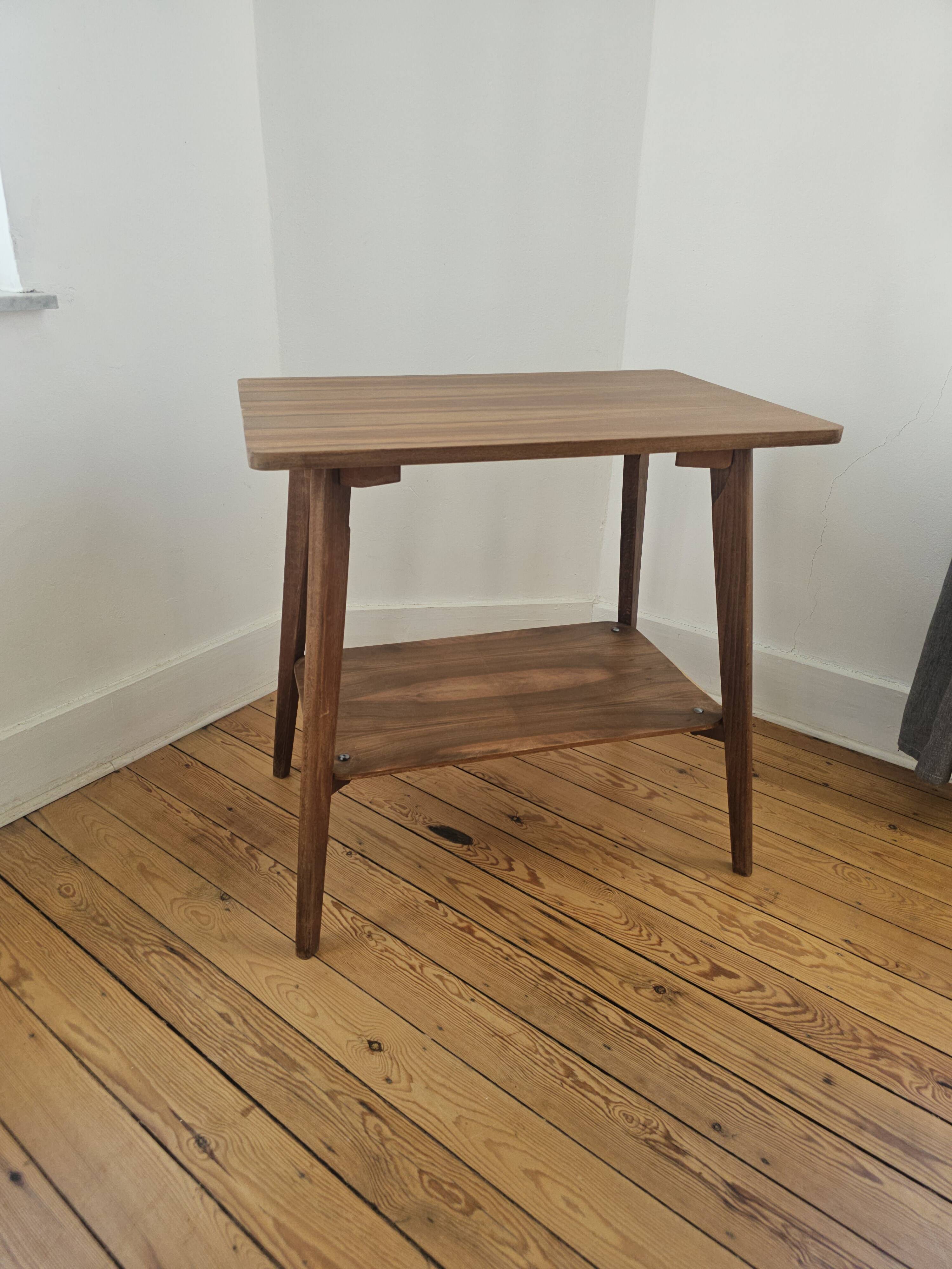 Vintage side table with double top in Scandinavian style.