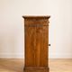 Antique bedside table in waxed wood