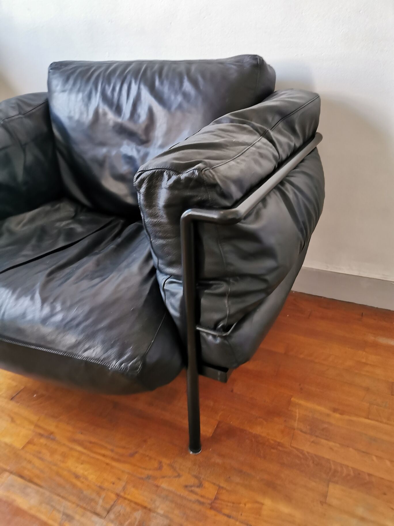 Black leather armchair circa 1970