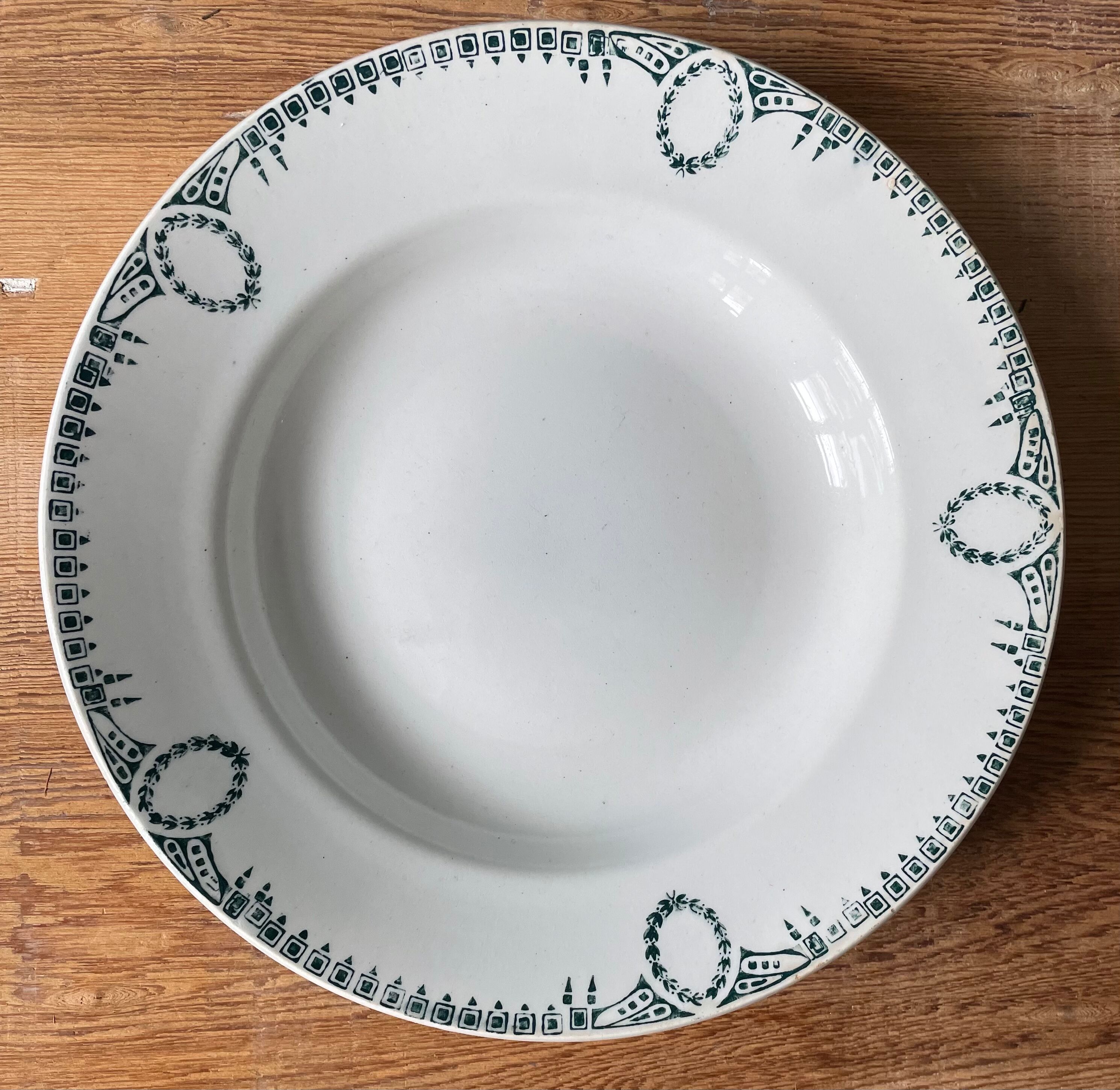 Set of 4 old hollow plates St Amand Terre de Fer